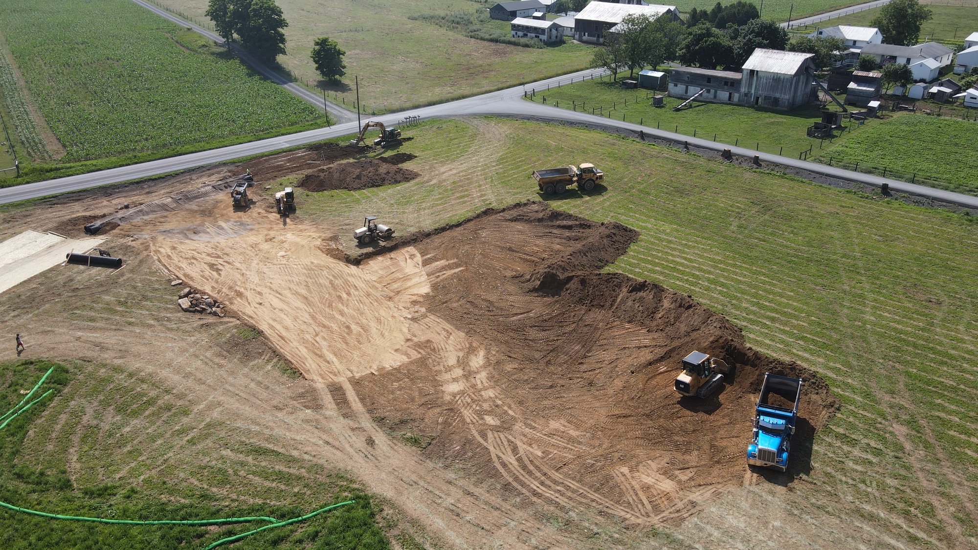 Aerial view of a rural site being graded and prepared