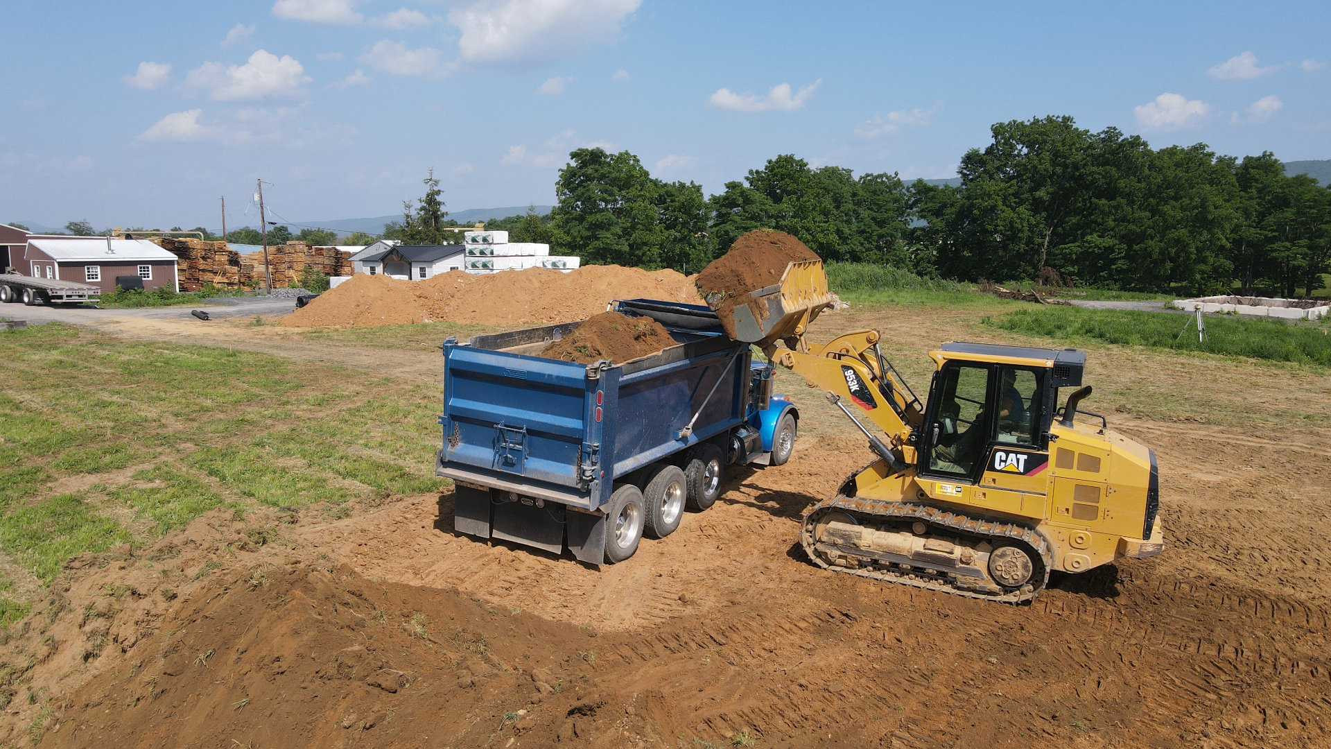 Loader working alongside a haul truck at the Belleville yard